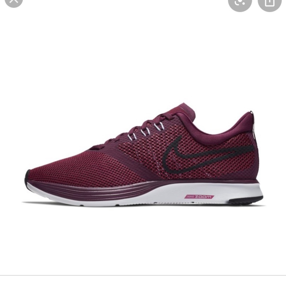 purple nike zoomstrike tennis shoes